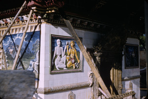 Paintings and reliefs on a small Hindu temple in Kathmandu