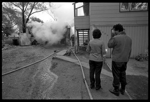 Man in anguish after learning that his garage was gutted by fire, and the family's cat was trapped inside