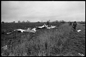 Wreckage of a small engine plane crashed in a field during a tornado