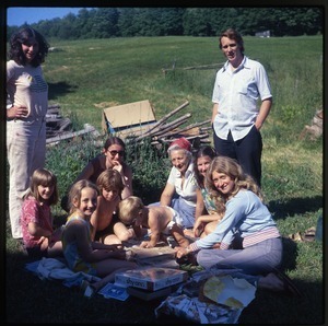 Nina Keller, friends, and family at picnic, Montague Farm Commune