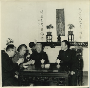 Shirley Graham Du Bois drinking tea with three unidentified Chinese officials