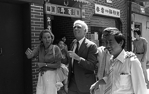 Kathryn White, Mayor Kevin White, Frank Chin, and Billy Chin walk through Chinatown during the 1979 August Moon Festival