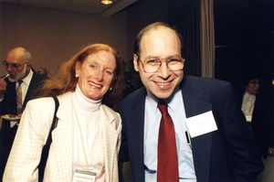 Suffolk University professors Karen Blum and Marc Perlin at a cocktail reception, 1990s