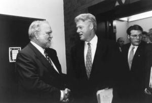 Congressman John Joseph Moakley shakes hands with President Bill Clinton during his visit to Boston, 19 February 1997