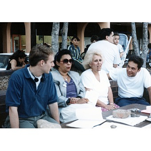 Inquilinos Boricuas en Acción board members staffing an information table outside.
