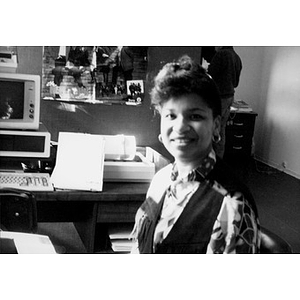 Lourdes Ortiz sitting in her office.