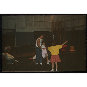 A Group of children dancing in the games room