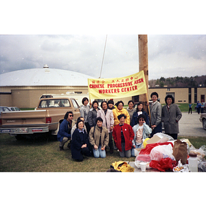 Members of Chinese Progressive Association Workers' Center at the International Paper Company march and rally