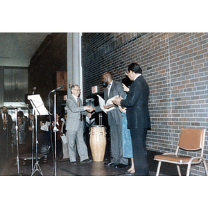 Henry Wong onstage with Mel King