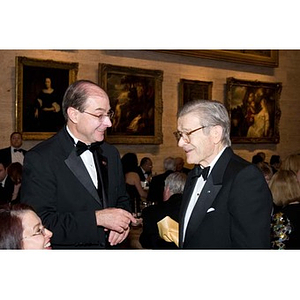 President Aoun converses with a man at his inauguration celebration