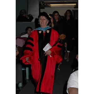 Faculty member, Dorett Hope, leads student procession into School of Nursing convocation