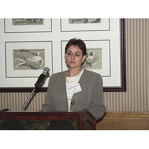 Iulia Lazar addressing audience at the gala dinner for John Hatsopoulos