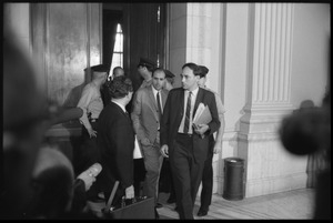 Legal team for Arthur Kinoy exiting from the Cannon Office Building at the House Un-American Activities Committee inquiry into New Left activism: William Kunstler (with folder) at far right