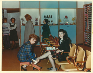 Customers being served in one of David Lipshire's shoe stores