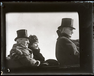 Woodrow Wilson and wife Edith, riding in a horse-drawn carriage