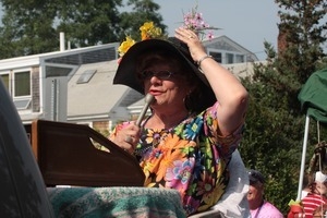 Parade marcher with a microphone : Provincetown Carnival parade