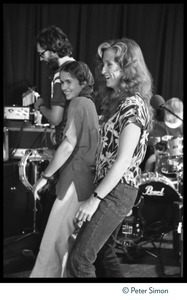 Bonnie Raitt and Nicolette Larson (from right) in the studio for the Musicians United for Safe Energy concert