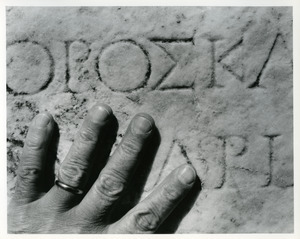 My hand on Greek inscription