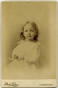 Alice Channing: half-length studio portrait with hands in lap