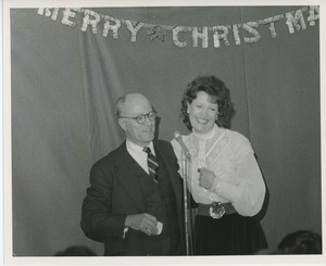 Nedo Cossei and Jeremiah Milbank, Jr. at holiday party