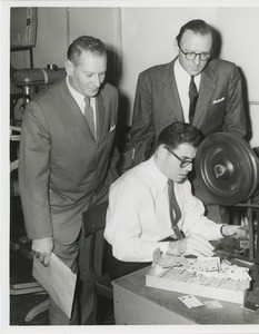 Leo Hausman and Orin Lehman observing client Leonard Rosen at work