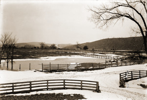 Winter scene of fence and pond adjacent to the Brooks-Fewell house (Greenwich, Mass.)