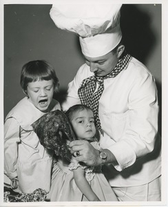 Leslee Trimble, Rosa Gonzales and chef Michael Malone with turkey