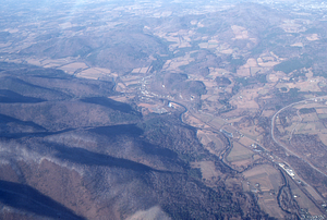 Oblique aerial photos accompanying 22 Dec 1994 Col-East air photo mission. 23. Hoosic River, VT State Route 43, Krieger Rocks, and US Route 7, Pownal, VT.