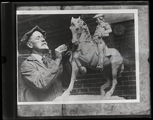 Cyrus Dallin working on a model of his Paul Revere statue