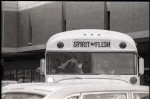 Free Spirit Press bus driving down Springfield city streets