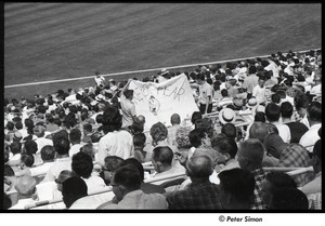Mets at Shea Stadium: sign in stands reading 'Never Fear' with a drawing of Mr. Met in the background