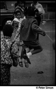 GIrls skipping rope in the parking lot, Liberation School, Boston, Mass.