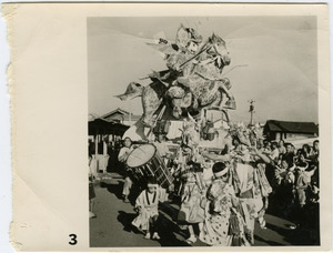 Elaborate float depicting a samurai on horseback in a matsuri procession
