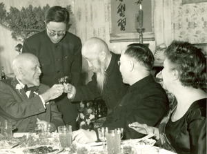 Chinese officials toast W. E. B. Du Bois on the celebration of his 91st birthday