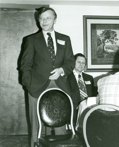 David C. Knapp standing indoors at Alumni Board meeting