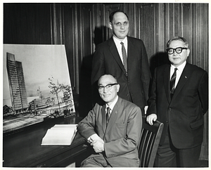 Deputy Mayor Henry Scagnoli (back) with two unidentified men