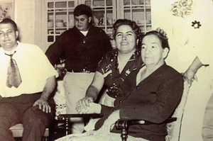 Maria Oliveira with family members