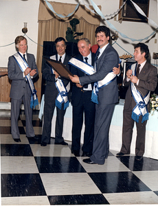 Helio M. Melo receiving award at LASA 2nd Division Champions Trophy Ceremony