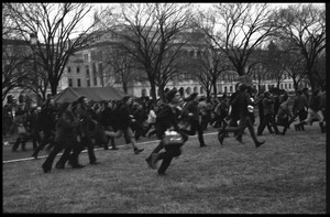 Demonstrators running from police across the Mall during the Counter-inaugural demonstrations, 1969, against the War in Vietnam