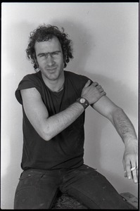 Studio portrait of Richard Safft, seated on a stool