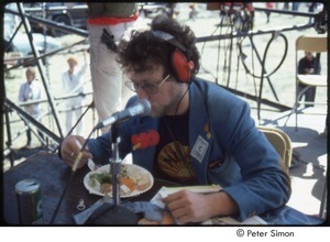 MUSE concert and rally: Danny Schechter at the No Nukes rally, eating