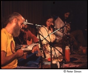 Ram Dass (left) on stage with Amazing Grace