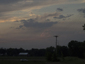 Electric lines silhouetted against a dramatic sky at sunset, Hatfield, Mass.