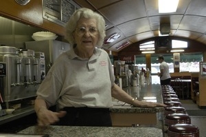 Waitress standing by the counter, Miss Florence Diner