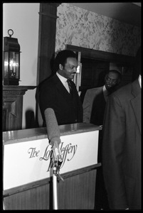 Jesse Jackson at the rostrum, preparing to speak