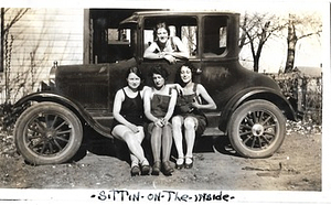 A Photograph of Dorris Bullard and Friends Posing with a Car