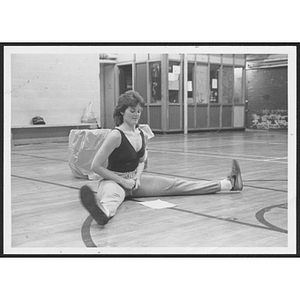 Instructor stretching in gym at Hyde Park branch