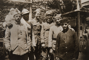 Mixed group of soldiers posed for a photograph