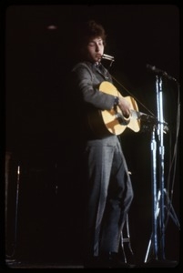 Bob Dylan performing on stage