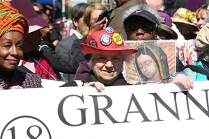 Granny Jailbirds contingent behind their banner in the march opposing the war in Iraq